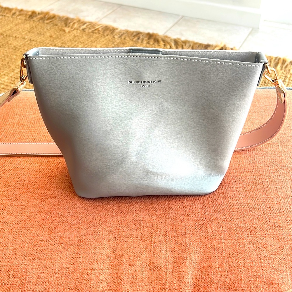 brand new two tone handbag. Use shoulder or wrist strap.